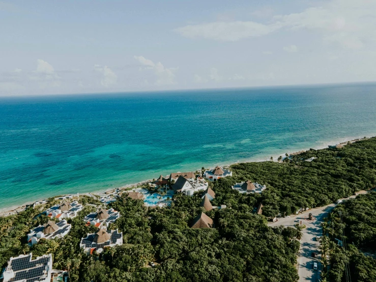 there is an island in the ocean by a beach