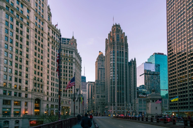 a person is walking down the road in the city