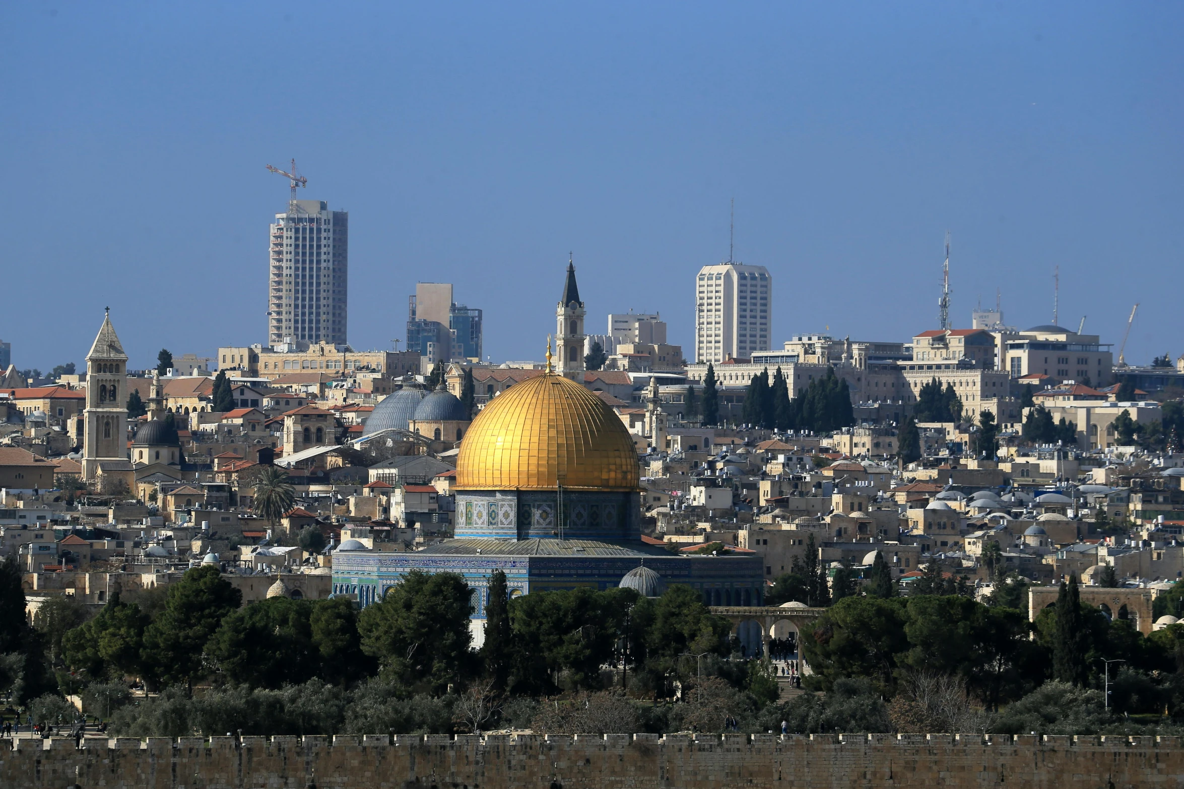 the dome of a mosque in the middle of the city