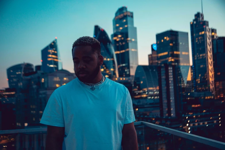 a man that is standing on top of a balcony