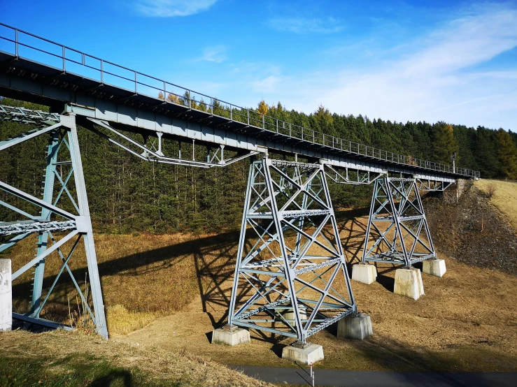 the metal bridge on the side of the highway