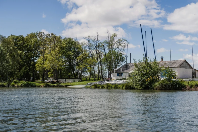 a house that is by the water in the day