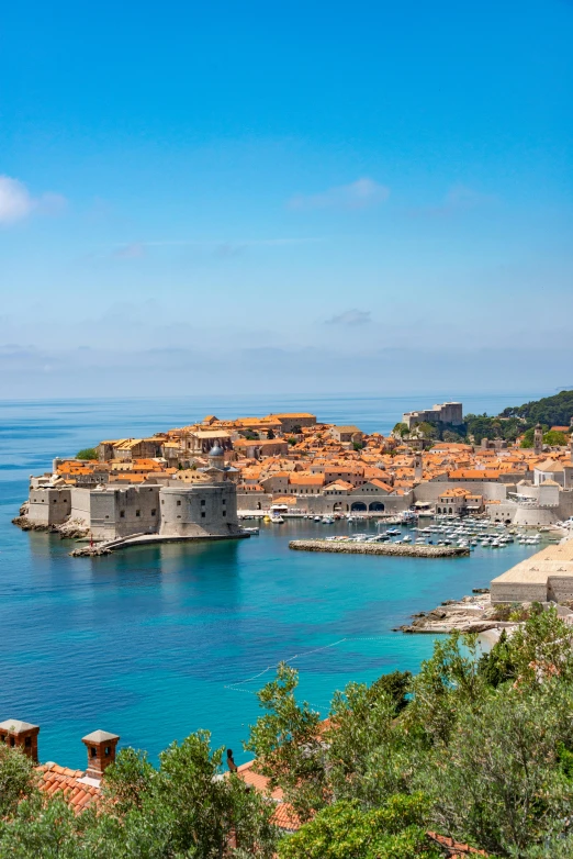 a view of a beautiful harbor next to the ocean