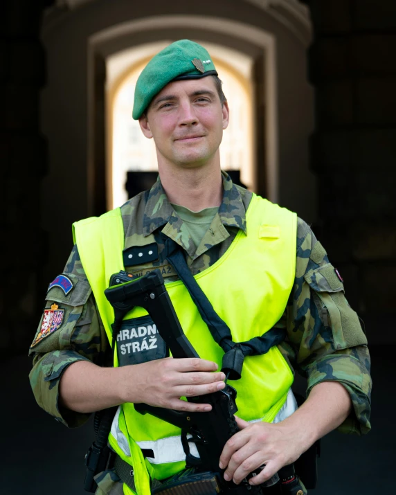 a soldier is taking a picture of himself