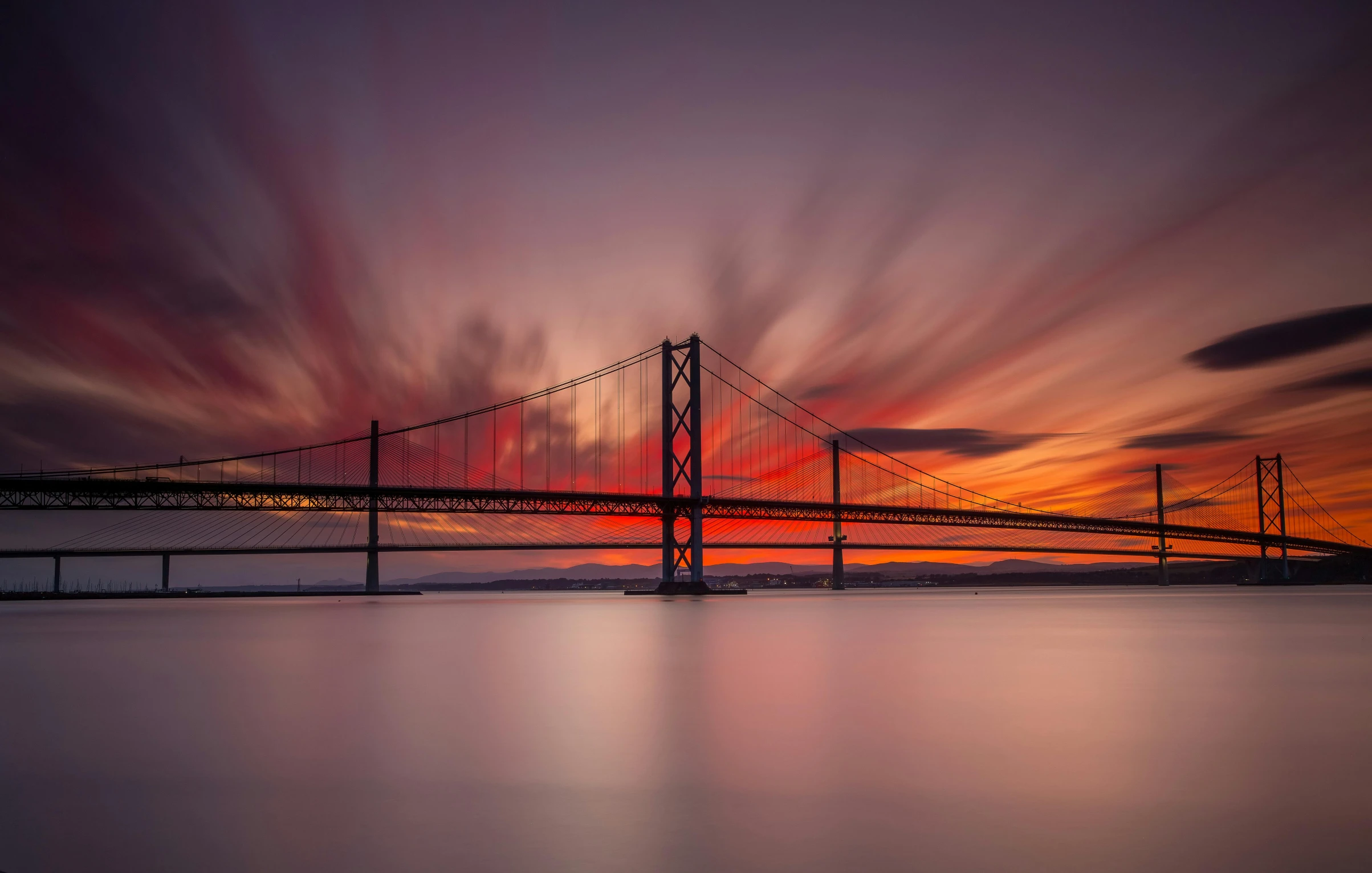 a bridge going over a large body of water