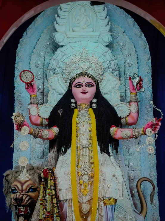 a statue of a woman surrounded by other decorations