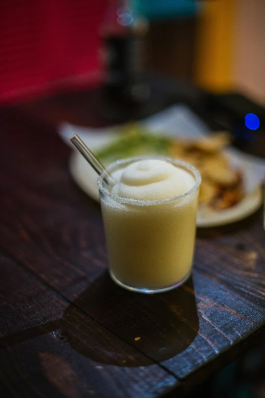 a close up of a drink on a table