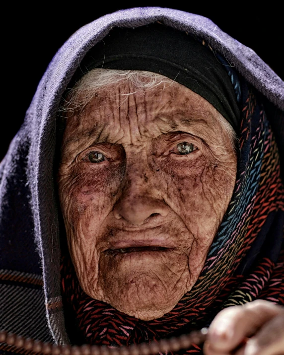 an old woman with wrinkles on her face