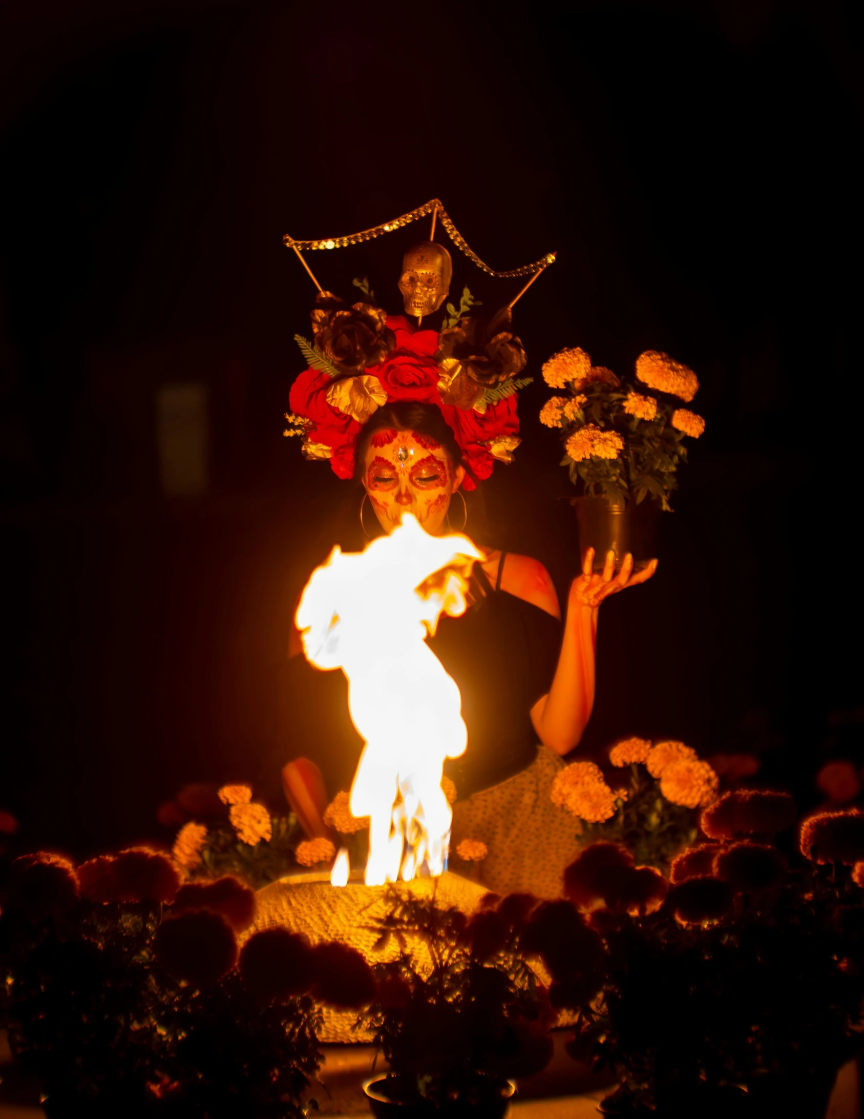 a statue with a fire on top of it