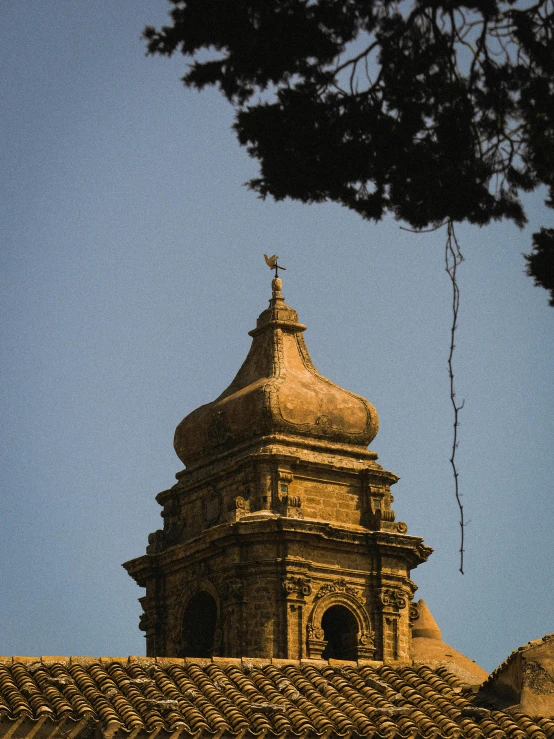 an old building that has a steeple on it