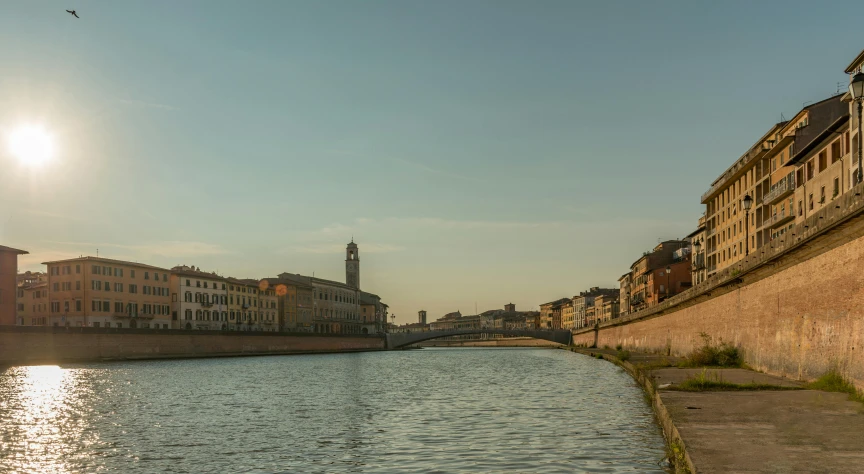 a body of water sitting next to some buildings