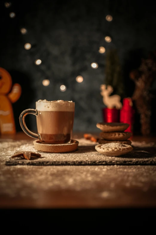 some cookies and a cup of coffee on a table