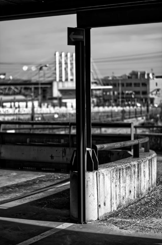 a view of some benches and water in a city