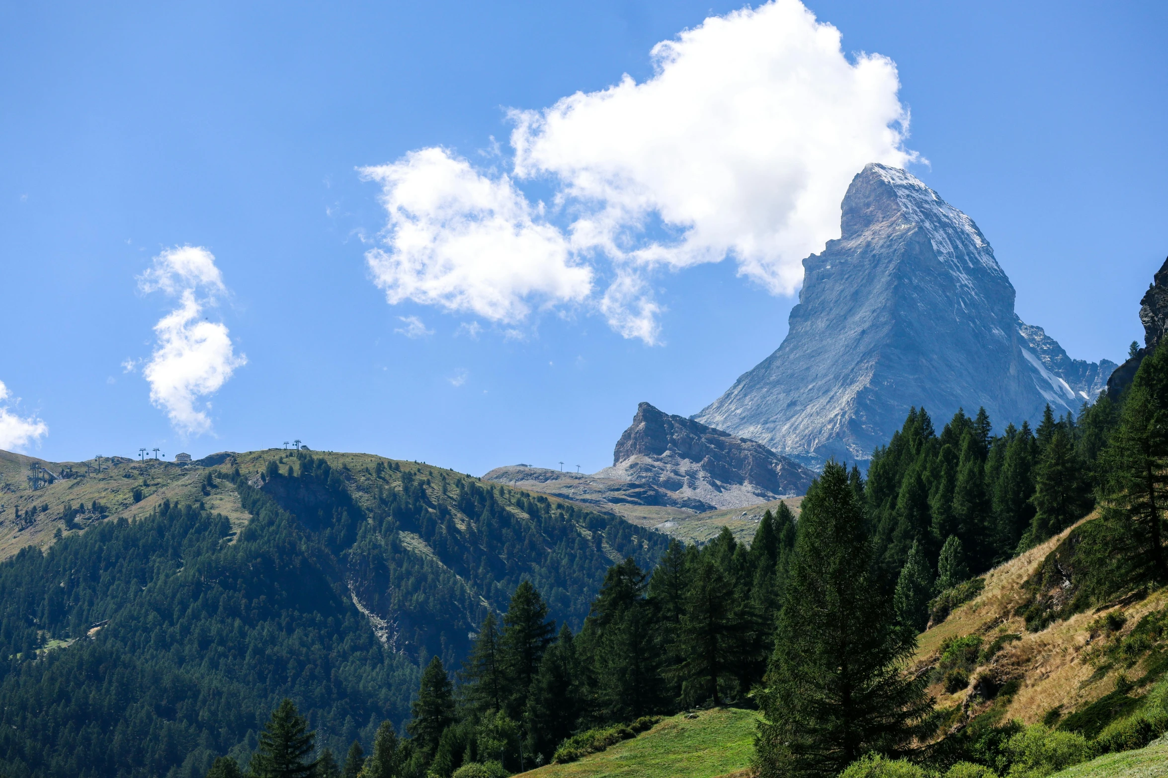 a mountain is seen against the clear sky