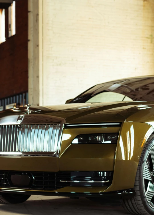 a very cool looking brown car parked by a building