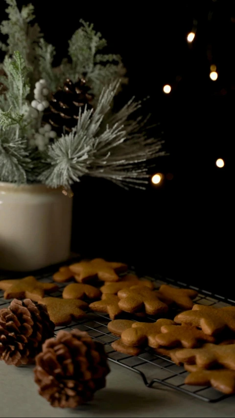 cookies on rack with decorations in bowl on counter