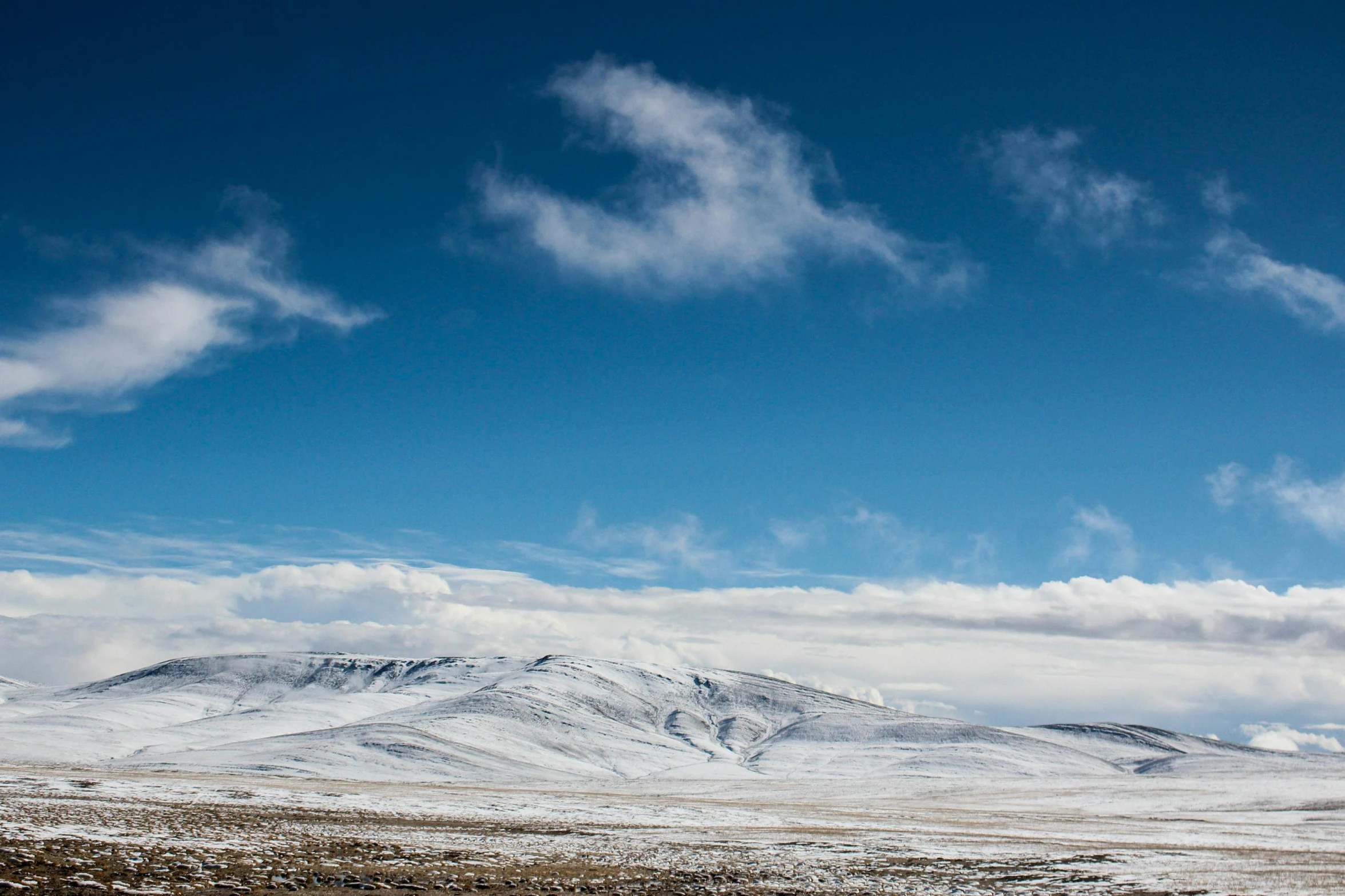 a very pretty snowy mountain side in the snow