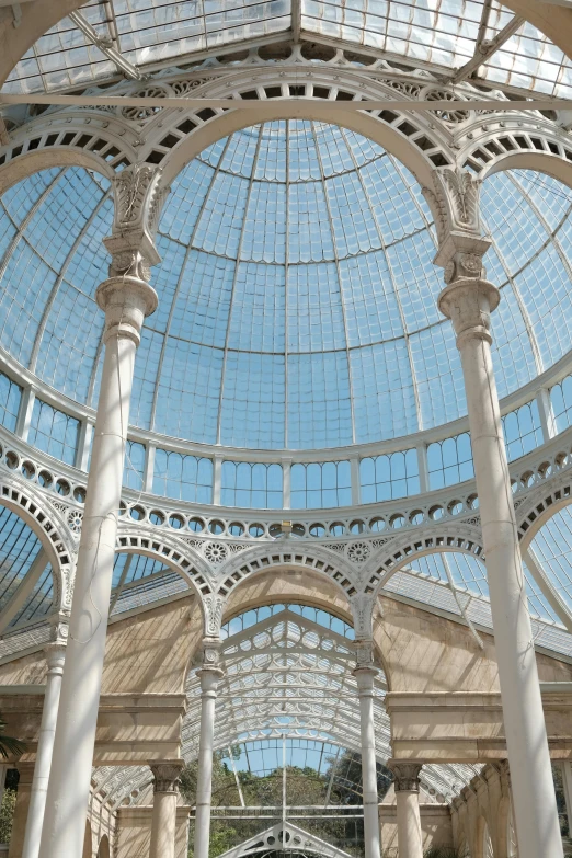 a view of a glass building ceiling through it
