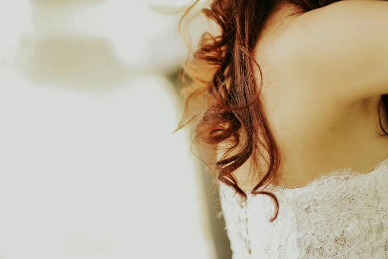 a girl in white top posing for a picture