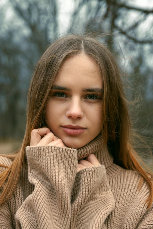 a close up of a person with a sweater