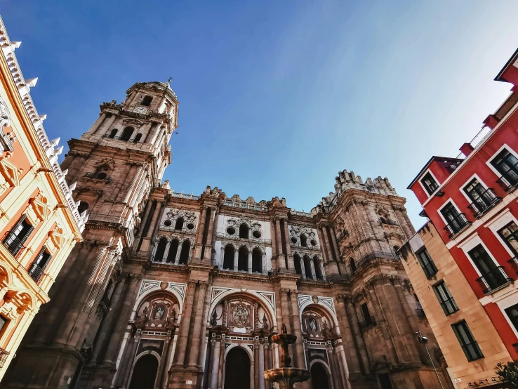 a picture of old architecture with tall buildings