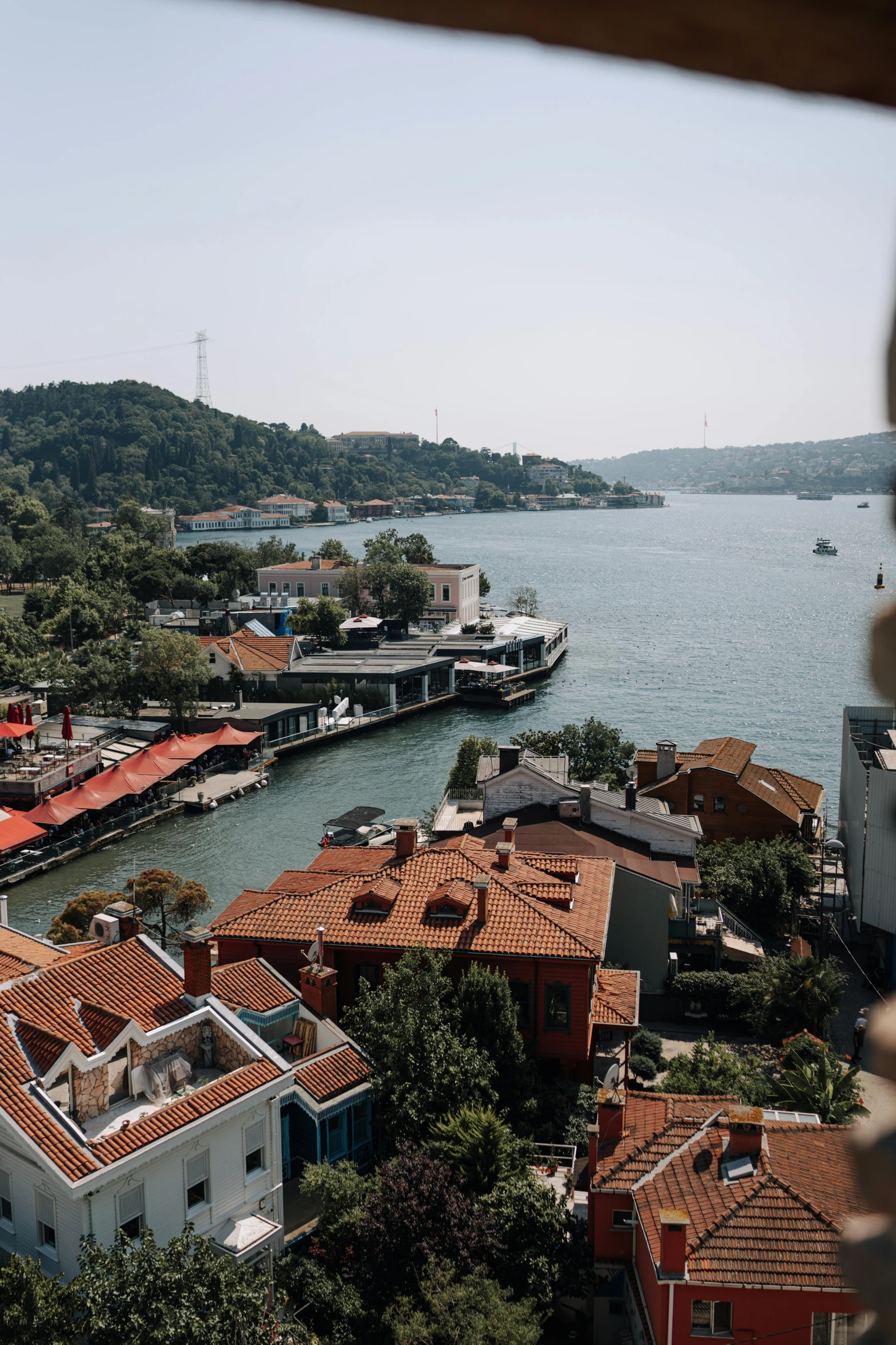 an overhead s of a large body of water with many boats docked next to it