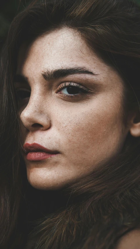 a close up po of a woman's face