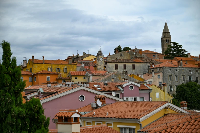 a city full of orange roofs and some buildings