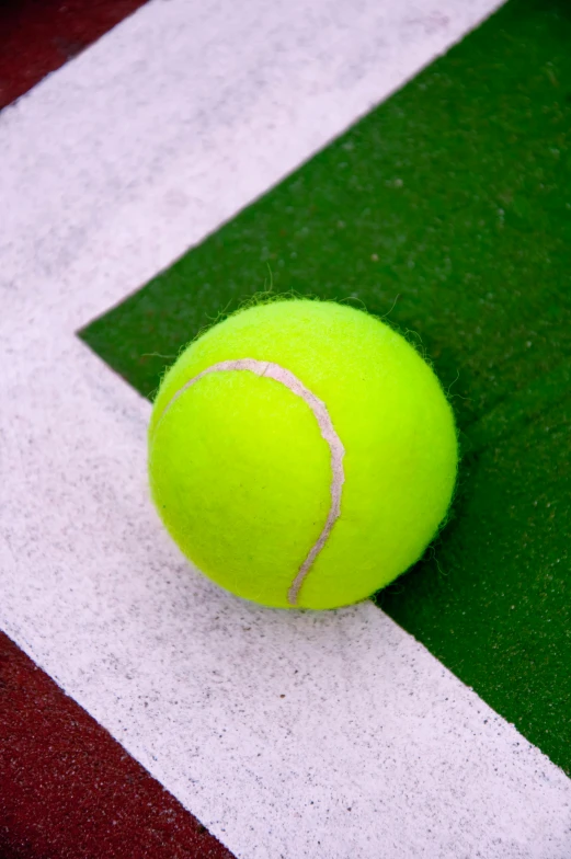 an overhead s of a yellow tennis ball