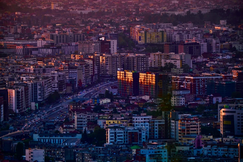 city scene showing a street lights in the dark