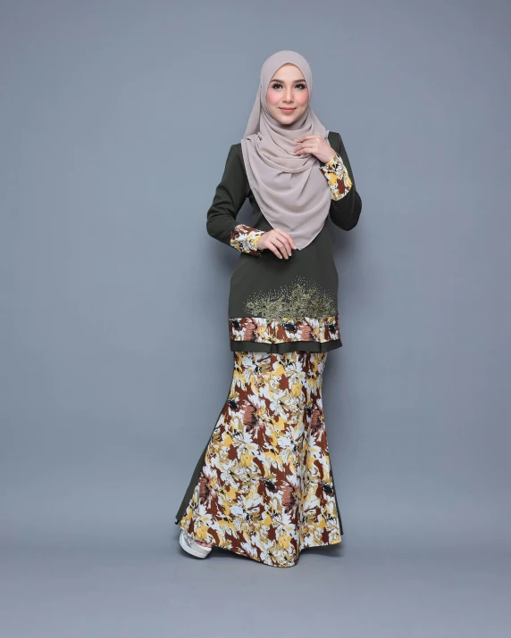 woman in floral printed hijab and black top