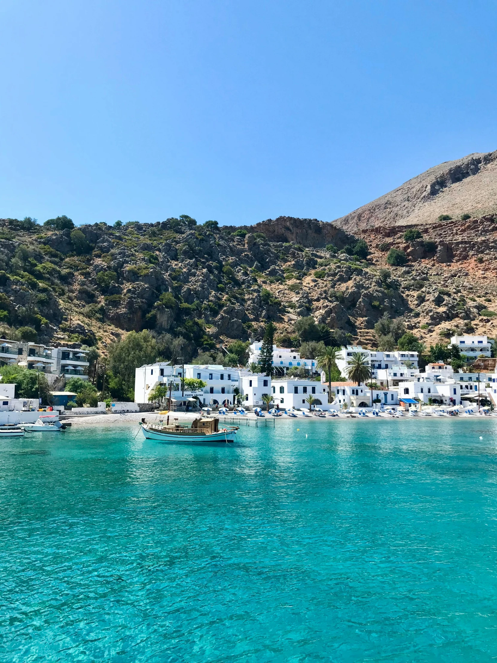 a beautiful view of some houses and the water