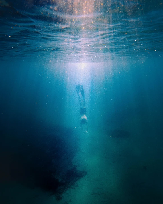 an open area with some water and a person