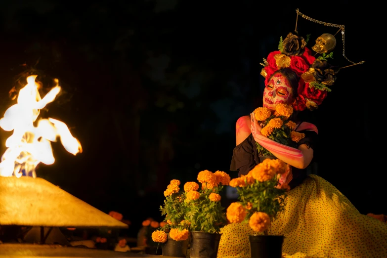 a woman with flowers in her hair and face