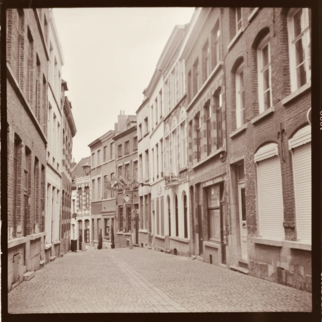 old fashioned buildings line the walkway leading to another