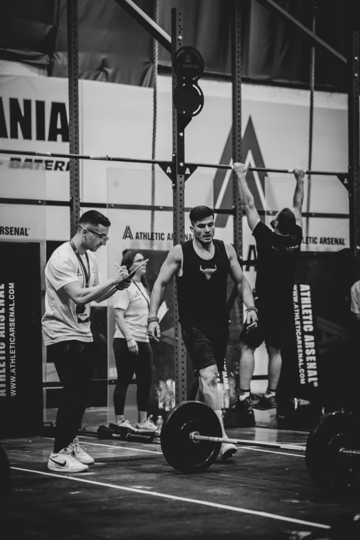 men on one side of the wall during an outdoor competition