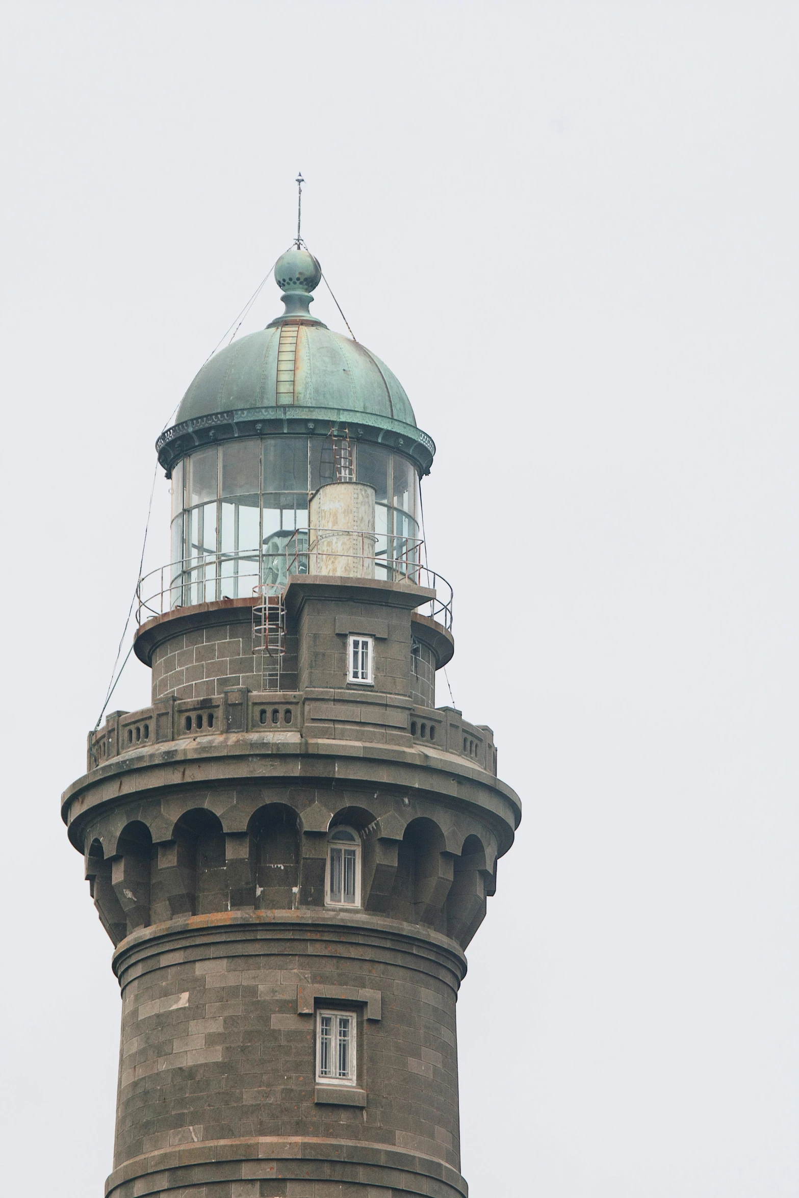 an old tower that is sitting on top of the building