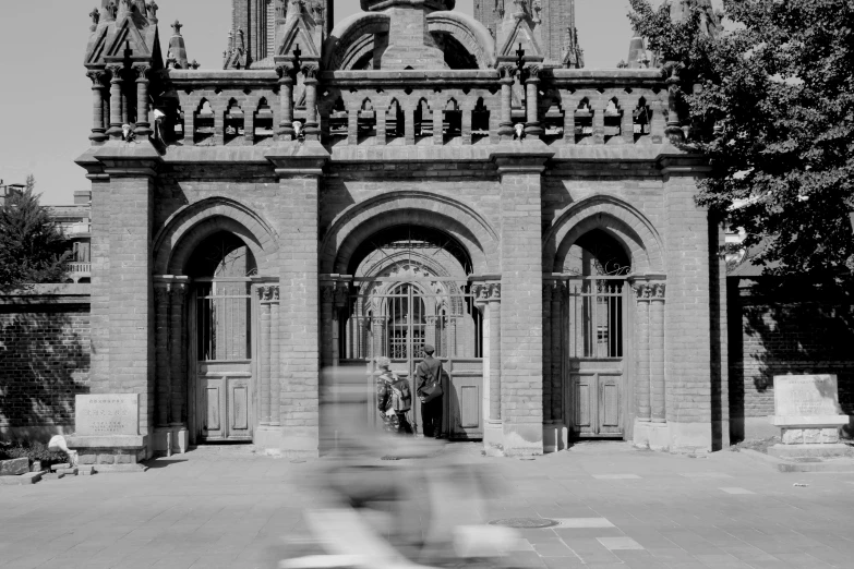 a building with an elaborate doorway and a clock tower