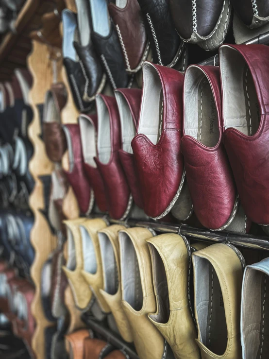 a large display of shoes in a shop