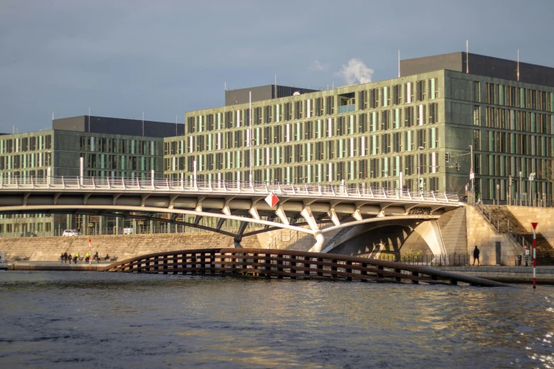 a bridge that has some buildings by it