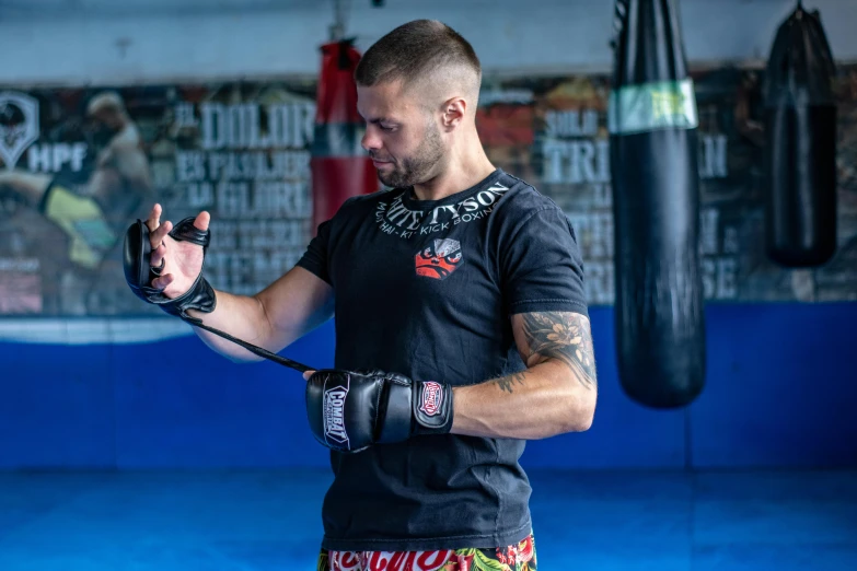 a man is practicing his boxing moves