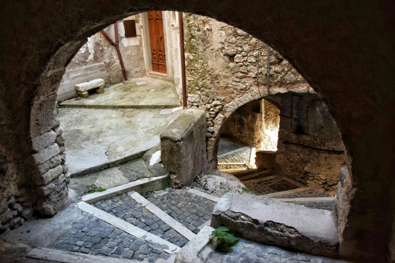 an image of a tunnel between buildings