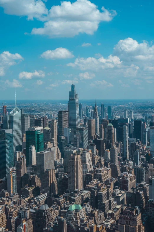 a view of city from above of a skyscr