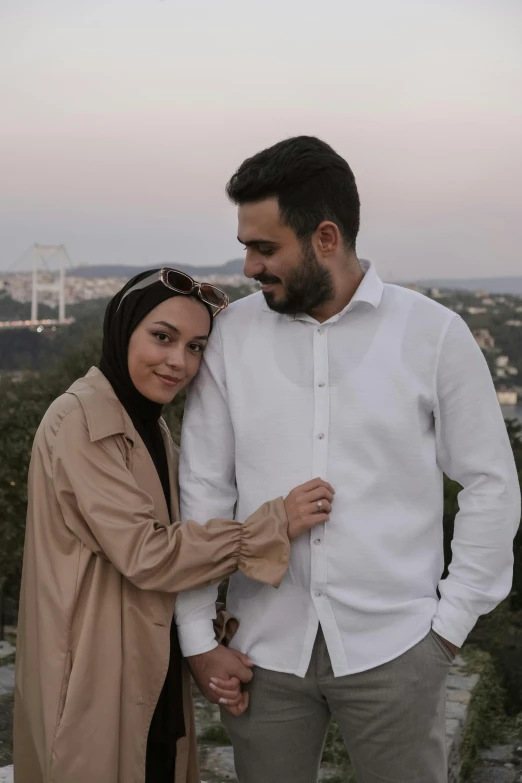 a man and woman are posing together for a po