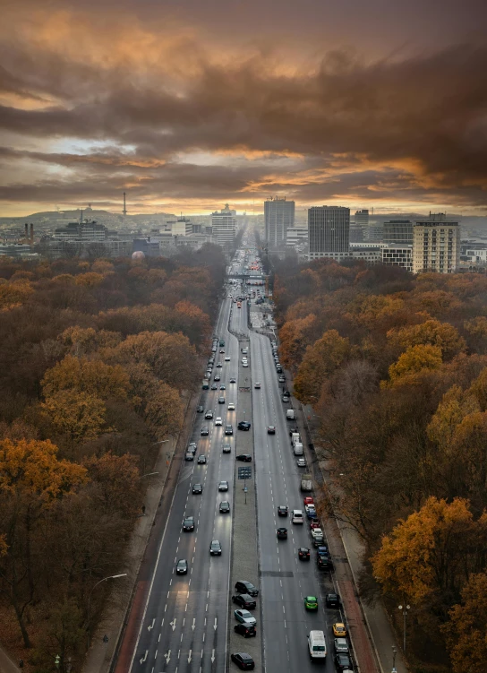 a view of the road with cars going down it