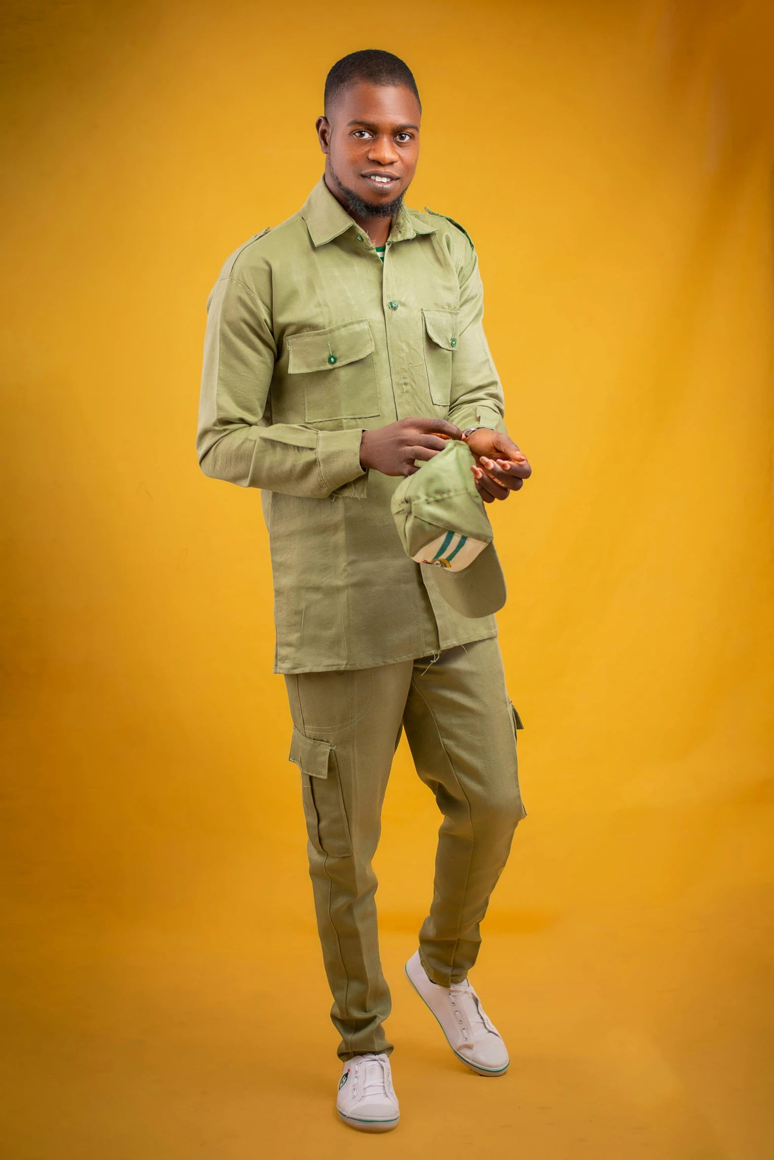 a man in military uniform poses for a picture