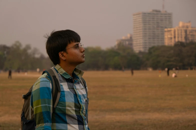 the man is enjoying playing with his kite