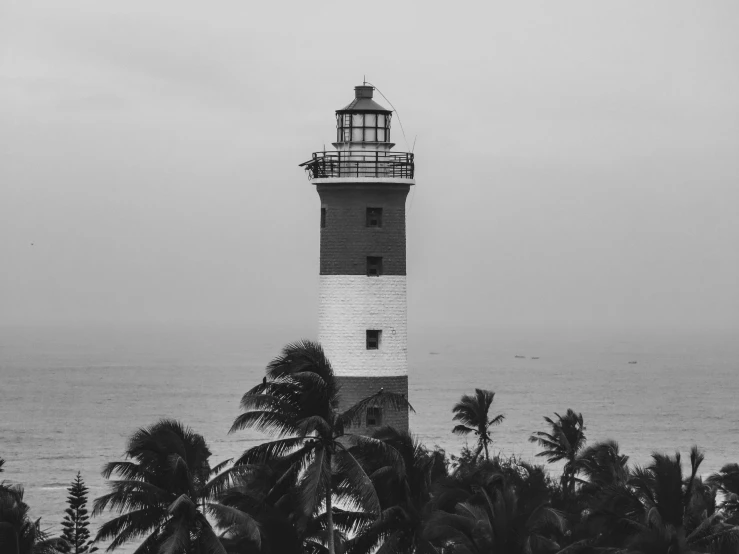 a white and black po of the lighthouse