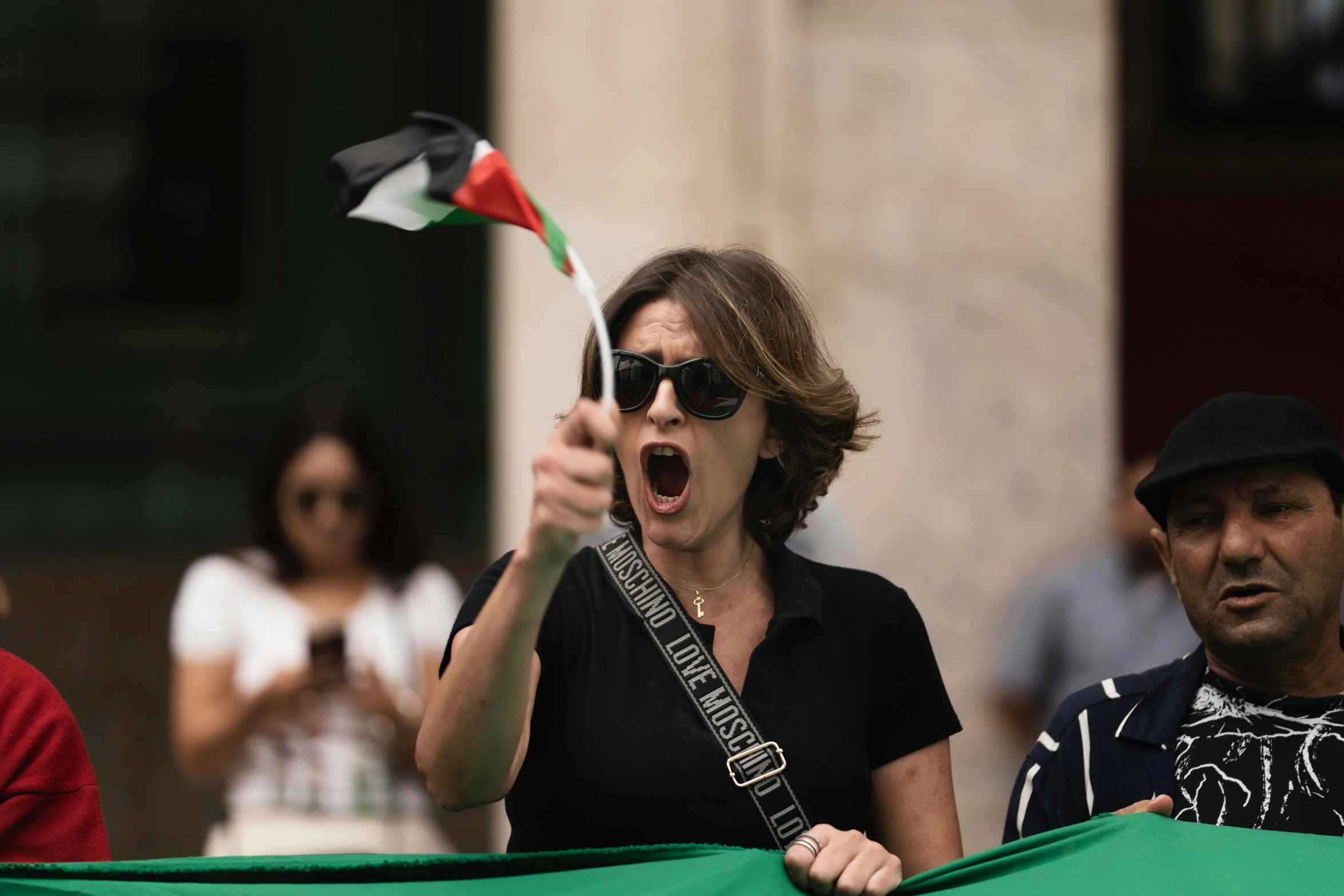 a woman celeting while playing a music band