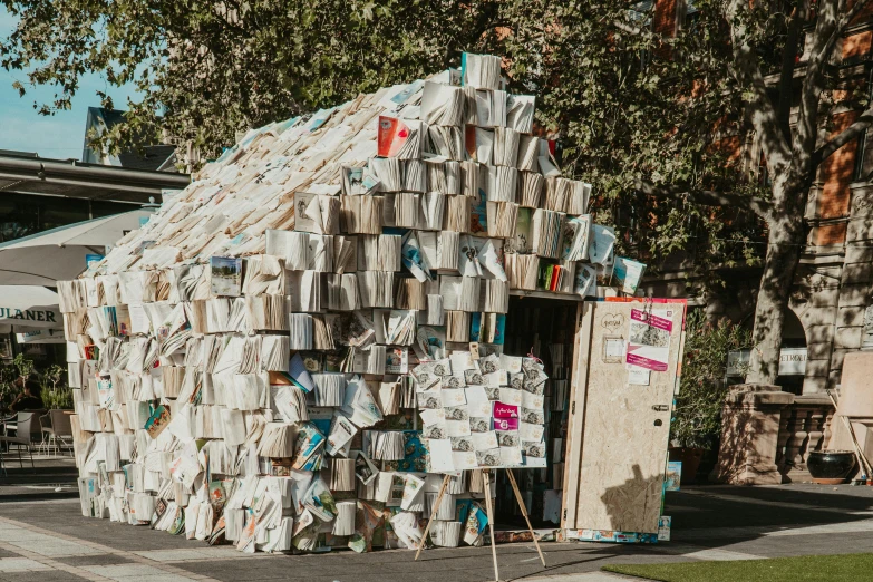 a small house made out of magazines and magazines